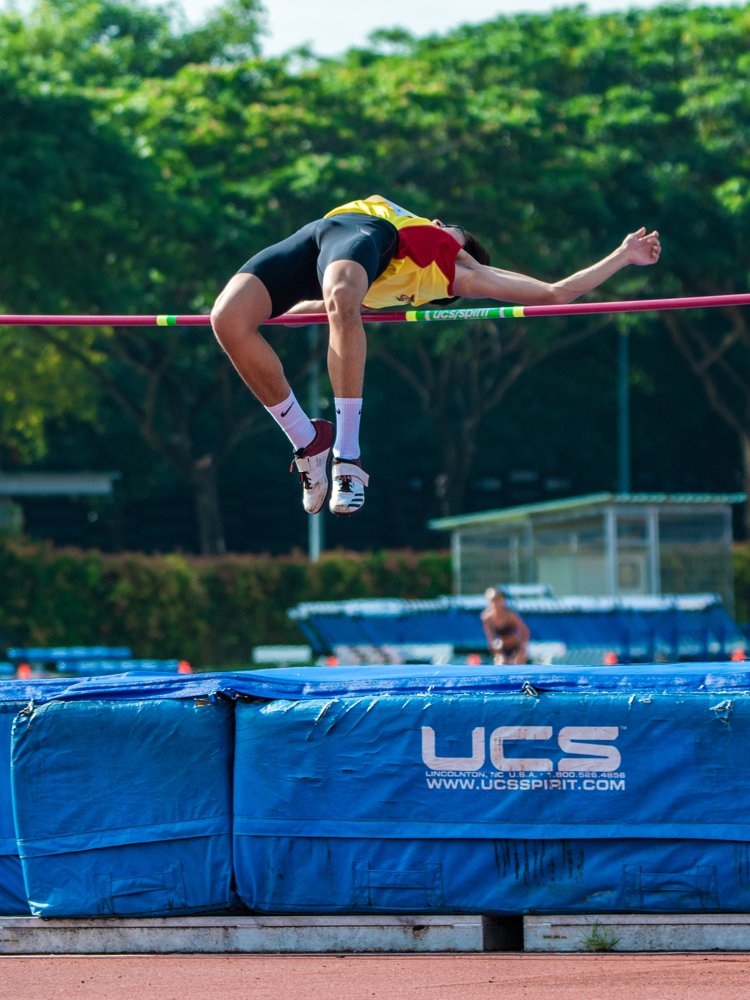 Abel clearing the bar in a high jump